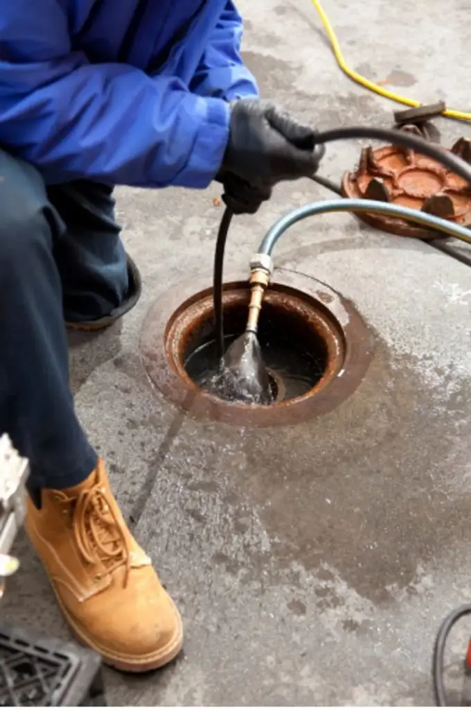 Clearing blocked drain lines to restore proper wastewater flow
