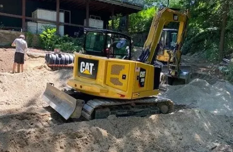 Excavation work for septic system installation and repair